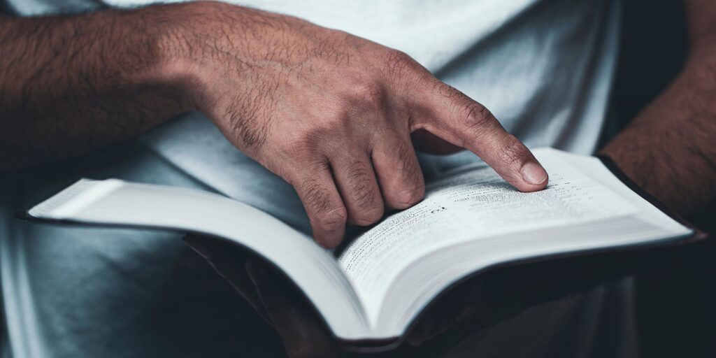 person reading bible